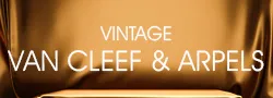 Gold background with text Vintage Van Cleef & Arpels.