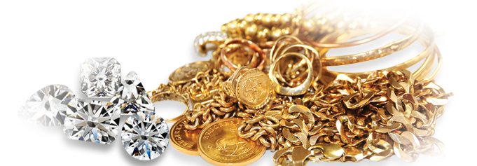 Pile of yellow gold scrap jewelry and loose round cut diamonds.