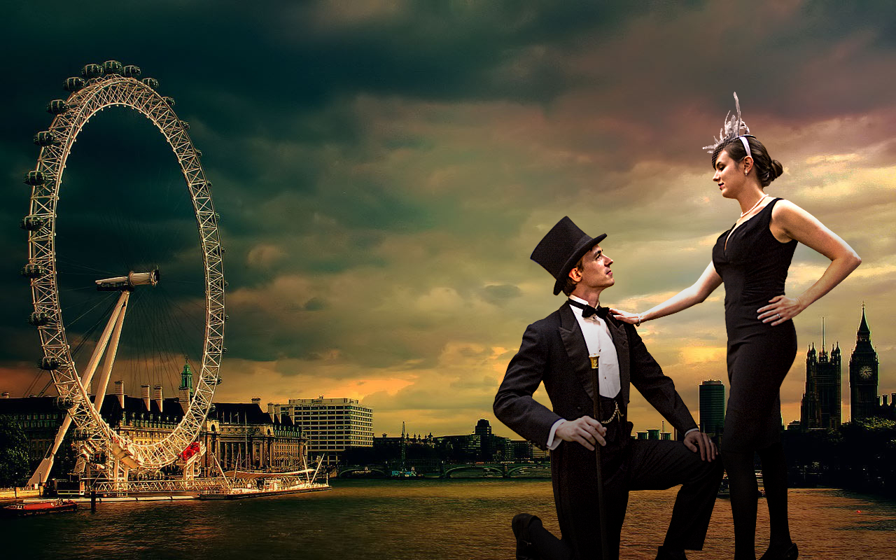 Man proposing to woman on beach in front of carnival, both dressed in 1920's attire.