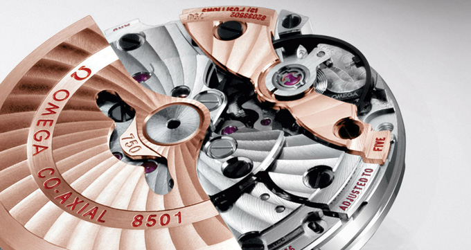 Close-up image of inner co-axial watch movement.