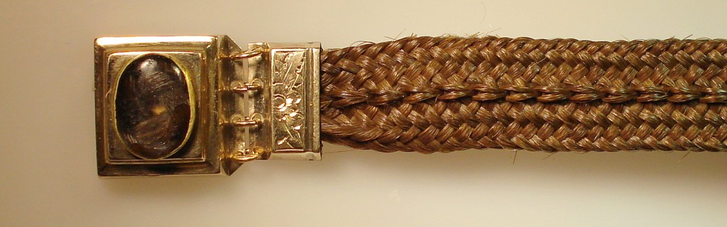 Close-up of Memento Mori bracelet clasp.