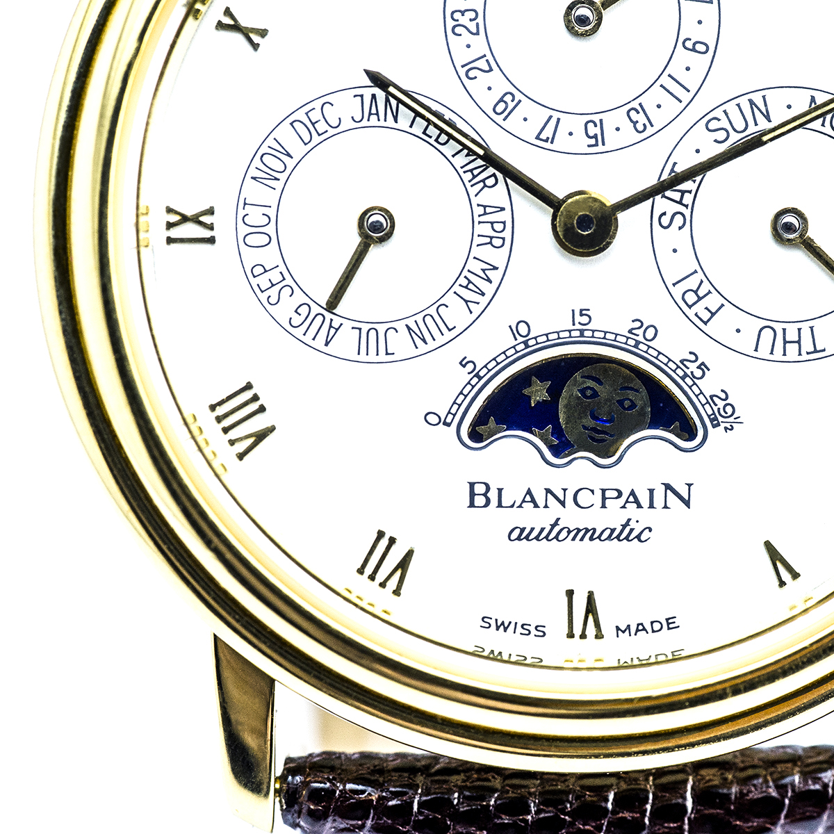 Vintage Blancpain in yellow gold with white Roman numeral dial.