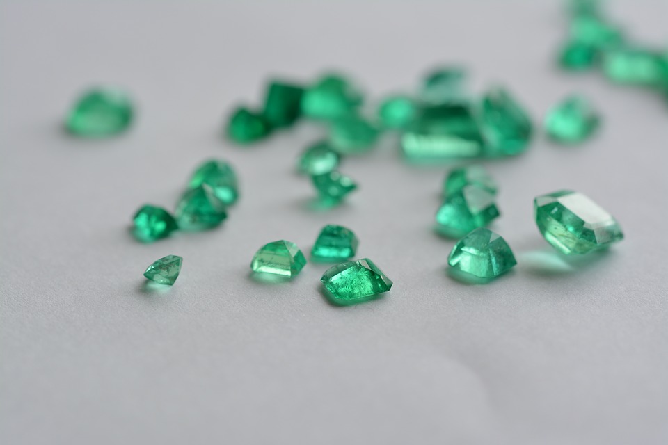 Loose cut emeralds.