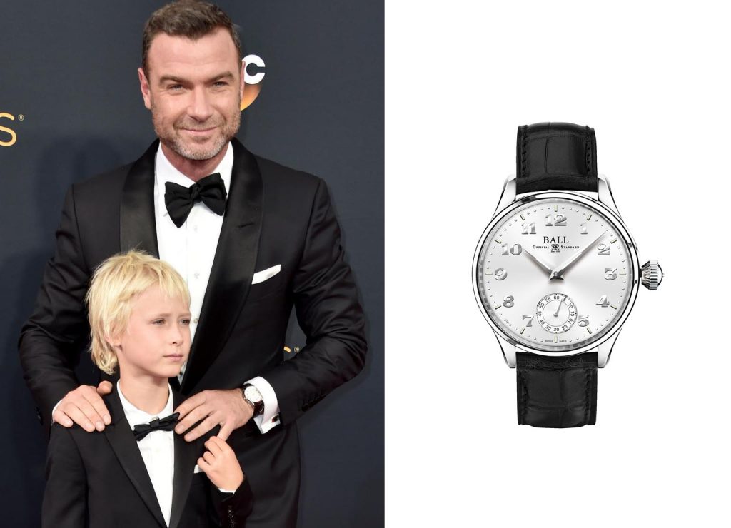 Celebrity wearing Ball Trainmaster Cleveland Night Express in stainless steel with a
white dial, sapphire crystal, black leather strap, and automatic movement.