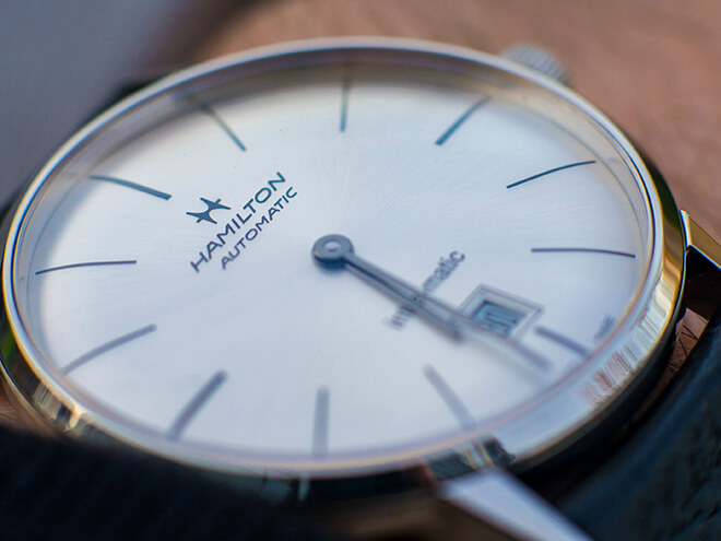 Close-up of a white Hamilton dial.