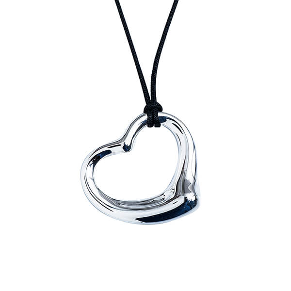 White gold open heart charm on a black cord necklace.