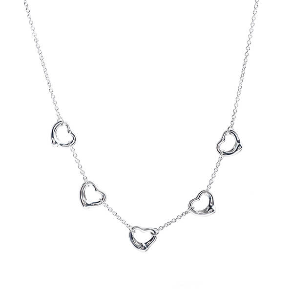 White gold five-station open heart necklace.