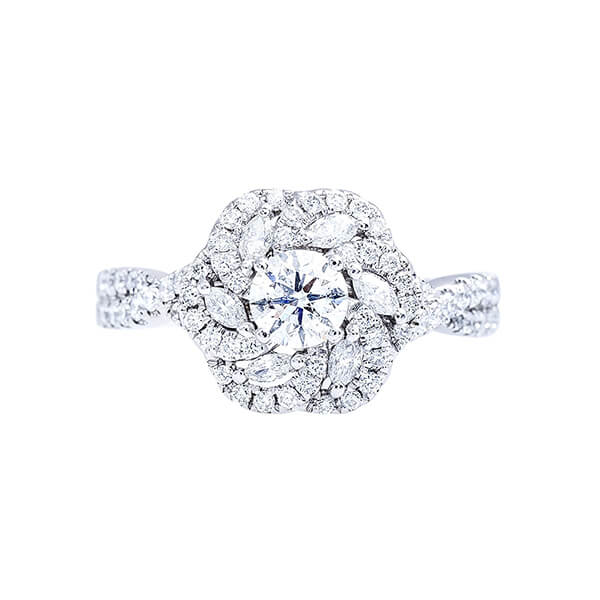 White gold twist shank diamond engagement ring with a floral diamond halo.