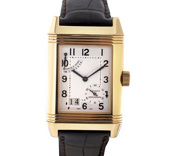 Pre-owned men’s Jaeger LeCoultre Reverso Grande Date in yellow gold with a dark brown leather strap.