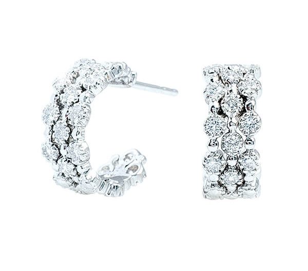 White gold Kwiat hoop earrings set with diamonds.