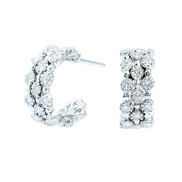 White gold Kwiat hoop earrings set with diamonds.