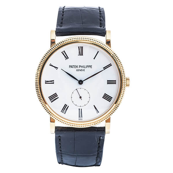 Pre-owned men’s Patek Philippe Calatrava in yellow gold with a black leather strap.