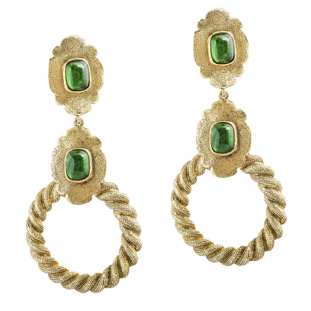 Yellow gold circle drop earrings set with green gemstones.