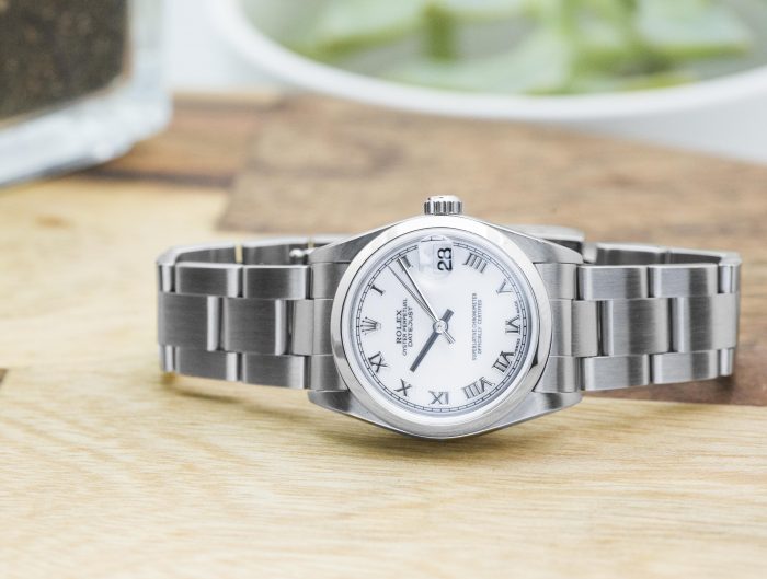 Pre-owned women’s Rolex Datejust in stainless steel with a white dial.