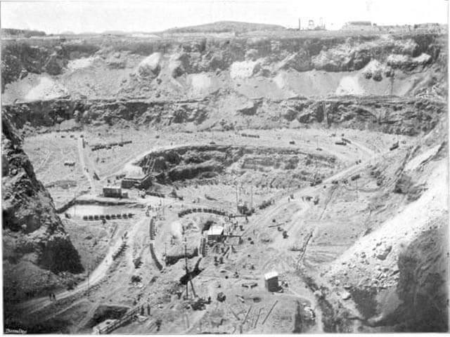 Aerial view of open pit diamond mine.