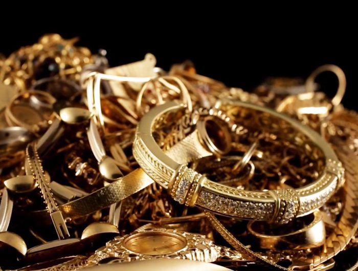 Pile of scrap gold jewelry.