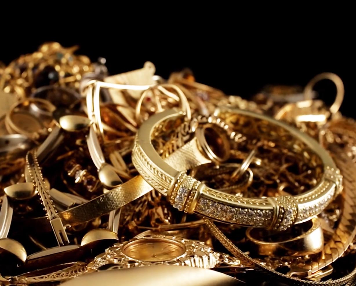 Pile of scrap gold jewelry.