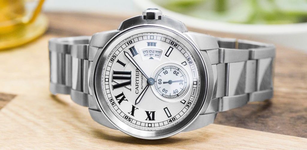 Pre-owned Cartier watch in stainless steel with a roman numeral dial.