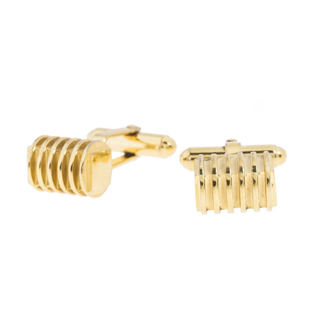 Vintage gold-tone Christian Dior barrel cufflinks.