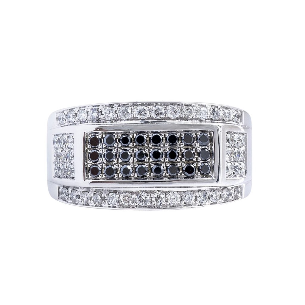 White gold ring set with black and white diamonds.