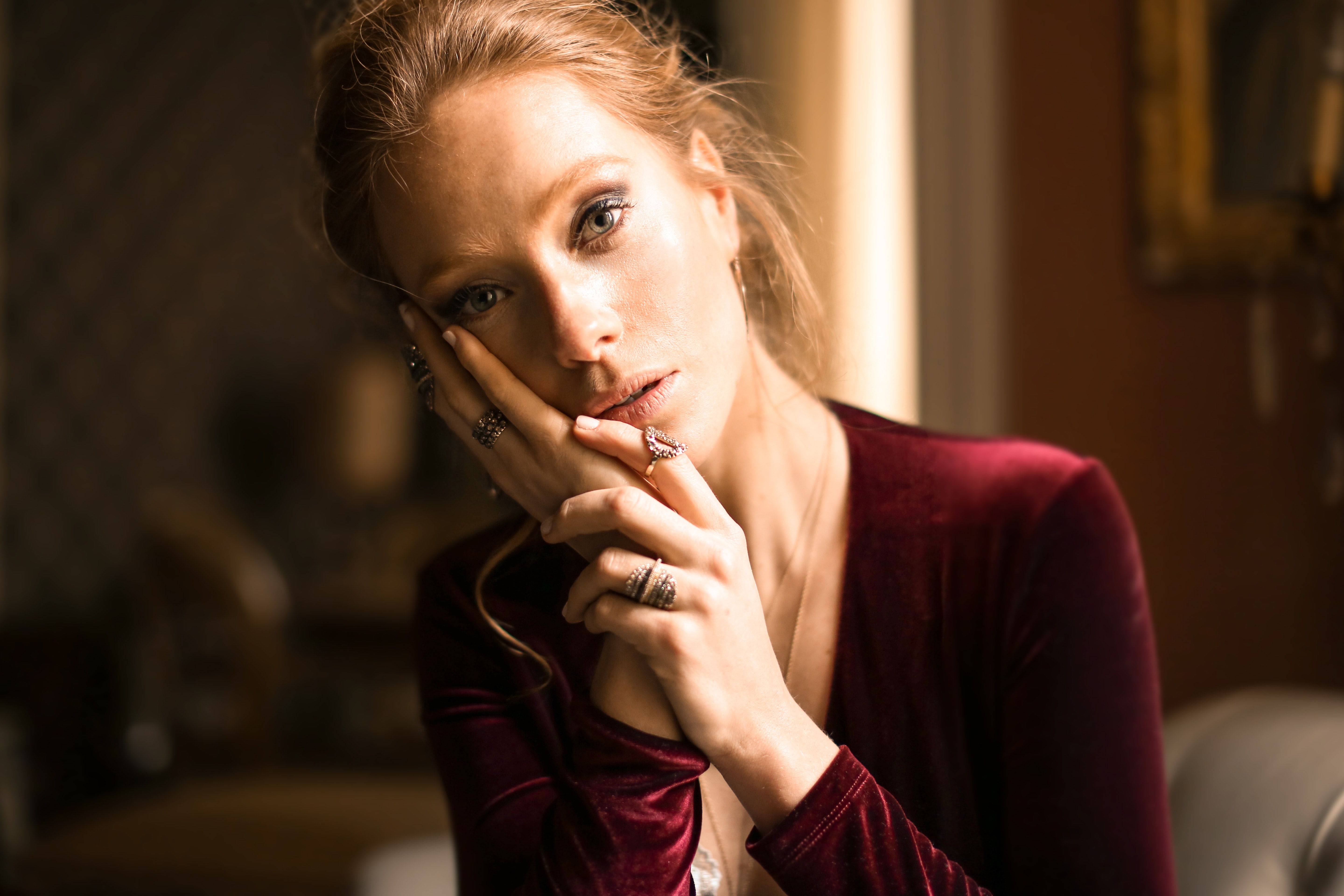 Woman wearing multiple stacking rings.