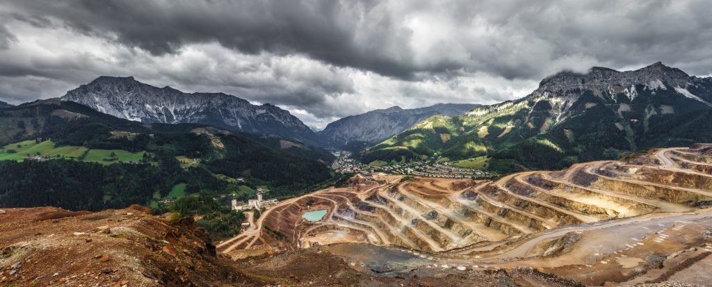 Aerial view of an open pit diamond mine.