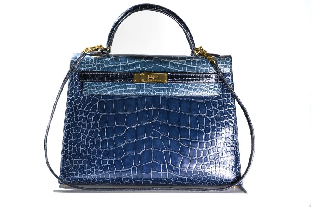 Vintage Hermès Kelly handbag in blue.