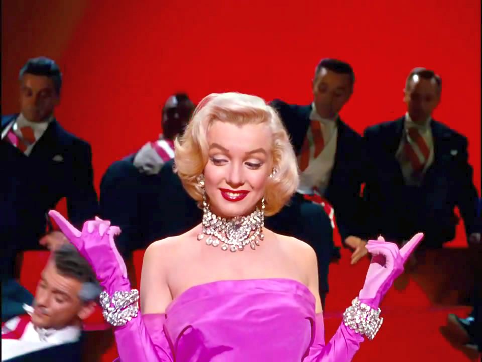 Still from Gentlemen Prefer Blondes showing Marilyn Monroe wearing a 500-year-old
diamond necklace and bracelet set.