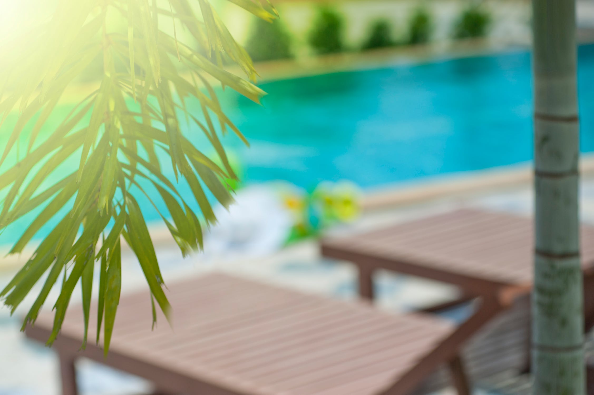 image of chairs sitting poolside