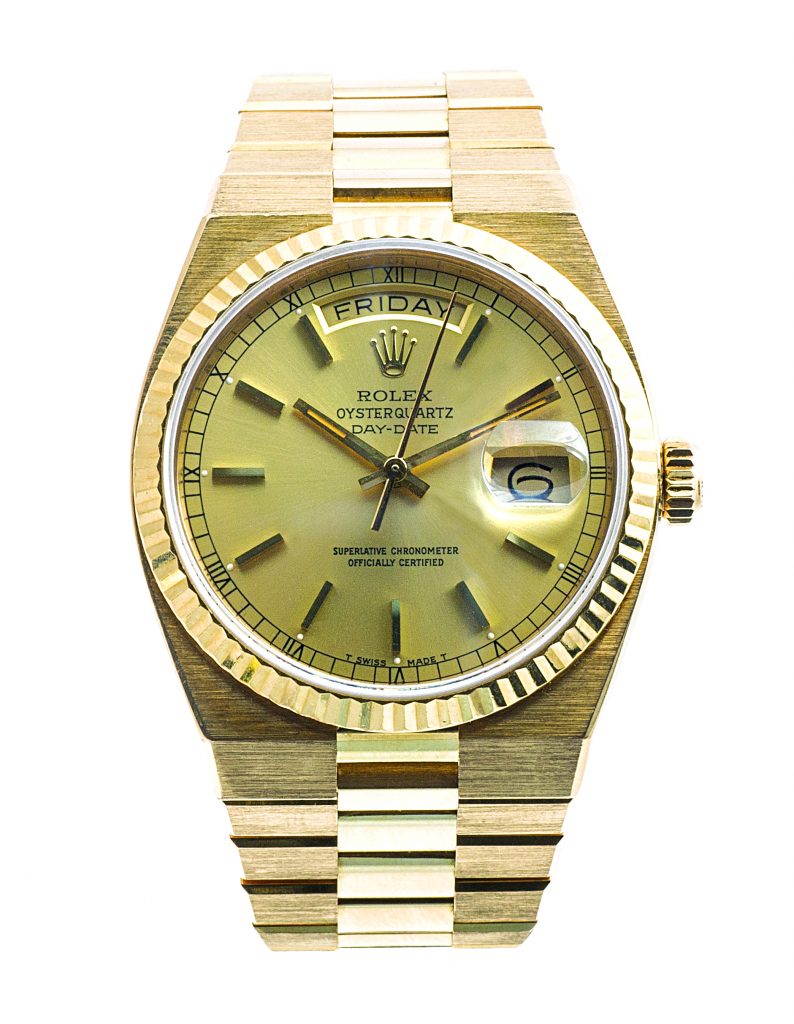 Pre-owned men’s Rolex Day-Date in yellow gold with Integrated bracelet.