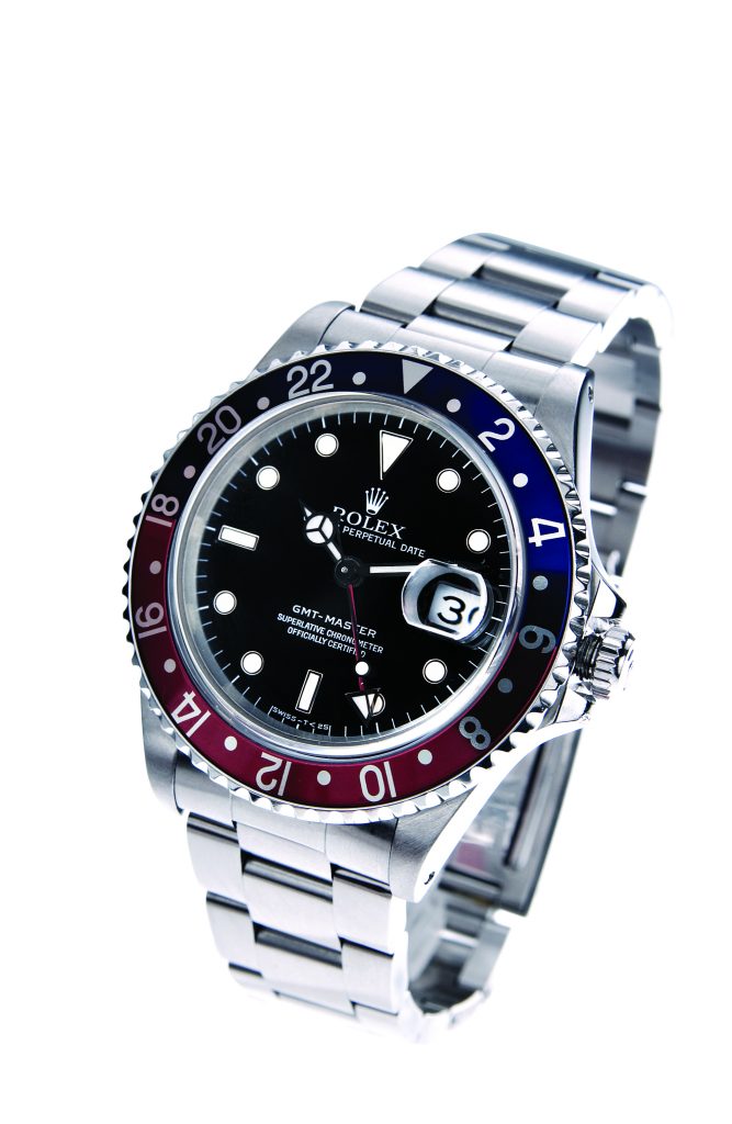 Pre-owned men’s Rolex GMT-Master in stainless steel with a blue and red Pepsi bezel.