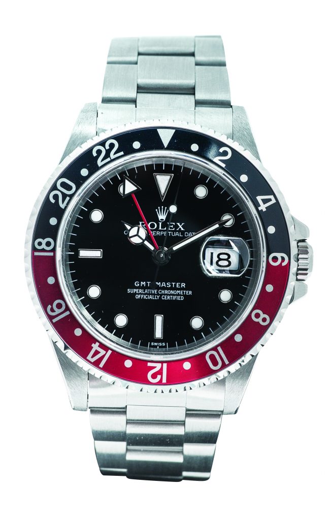 Pre-owned men’s Rolex GMT-Master in stainless steel with a black red bezel.