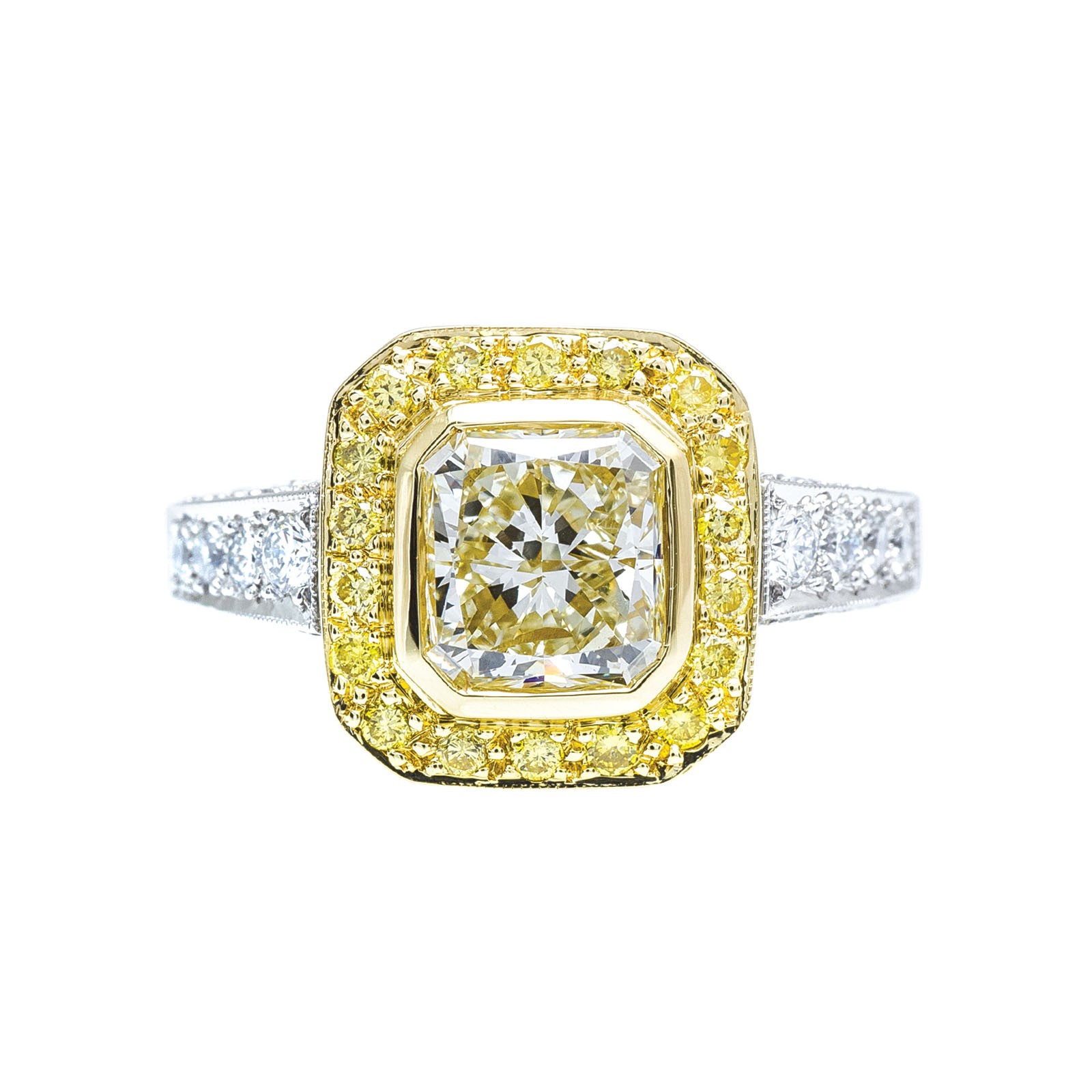 White gold two-row engagement ring centered with light fancy yellow and white diamond surrounded by a light fancy yellow diamond halo with white diamonds in the bands.