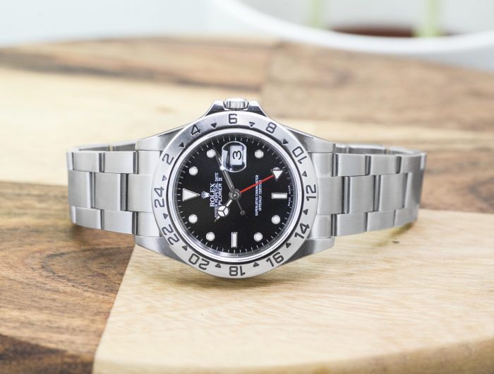 Pre-owned men’s Rolex Explorer II in stainless steel with a black dial.