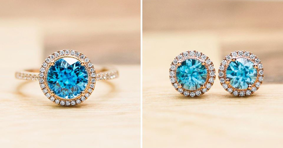 Yellow gold blue zircon ring with diamond halo and rose gold blue zircon stud earrings
with diamond haloes.