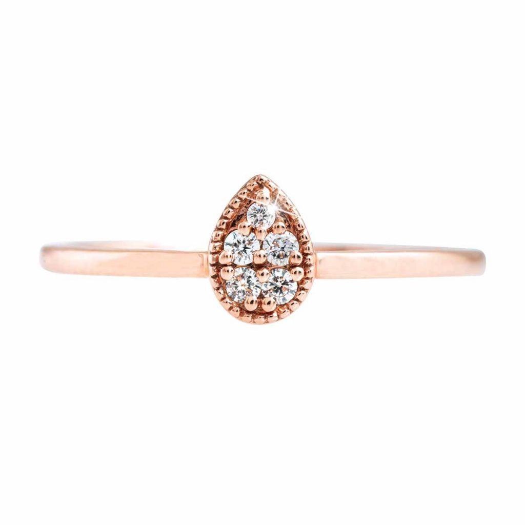 Rose gold cluster diamond engagement ring.