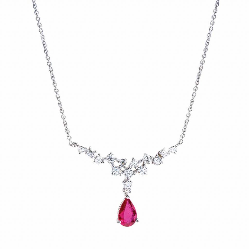 White gold diamond and ruby drop necklace.