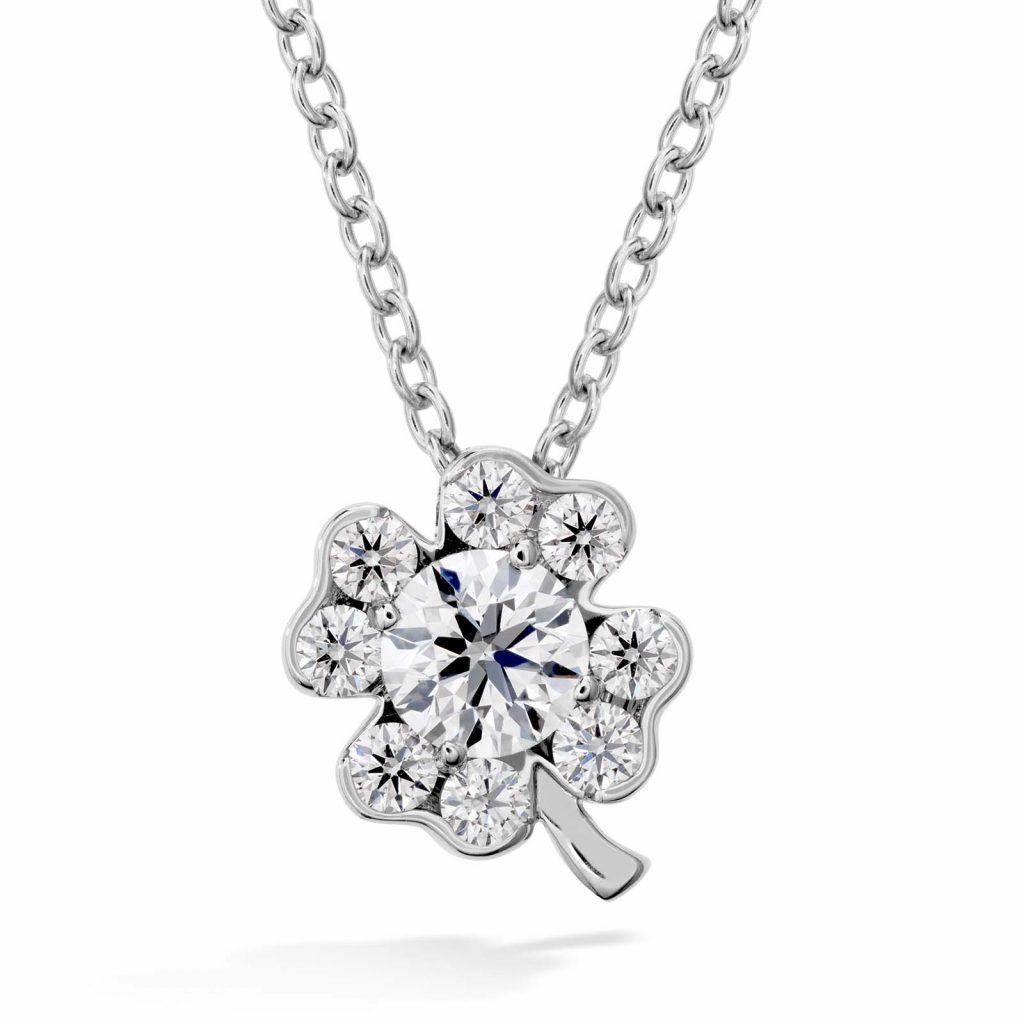 White gold clover diamond pendant necklace.