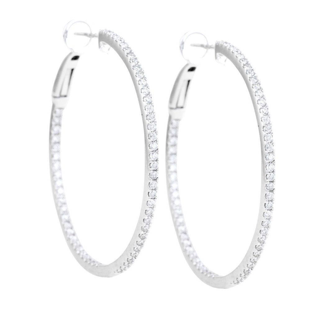 White gold inside-out hoop earrings set with diamonds.