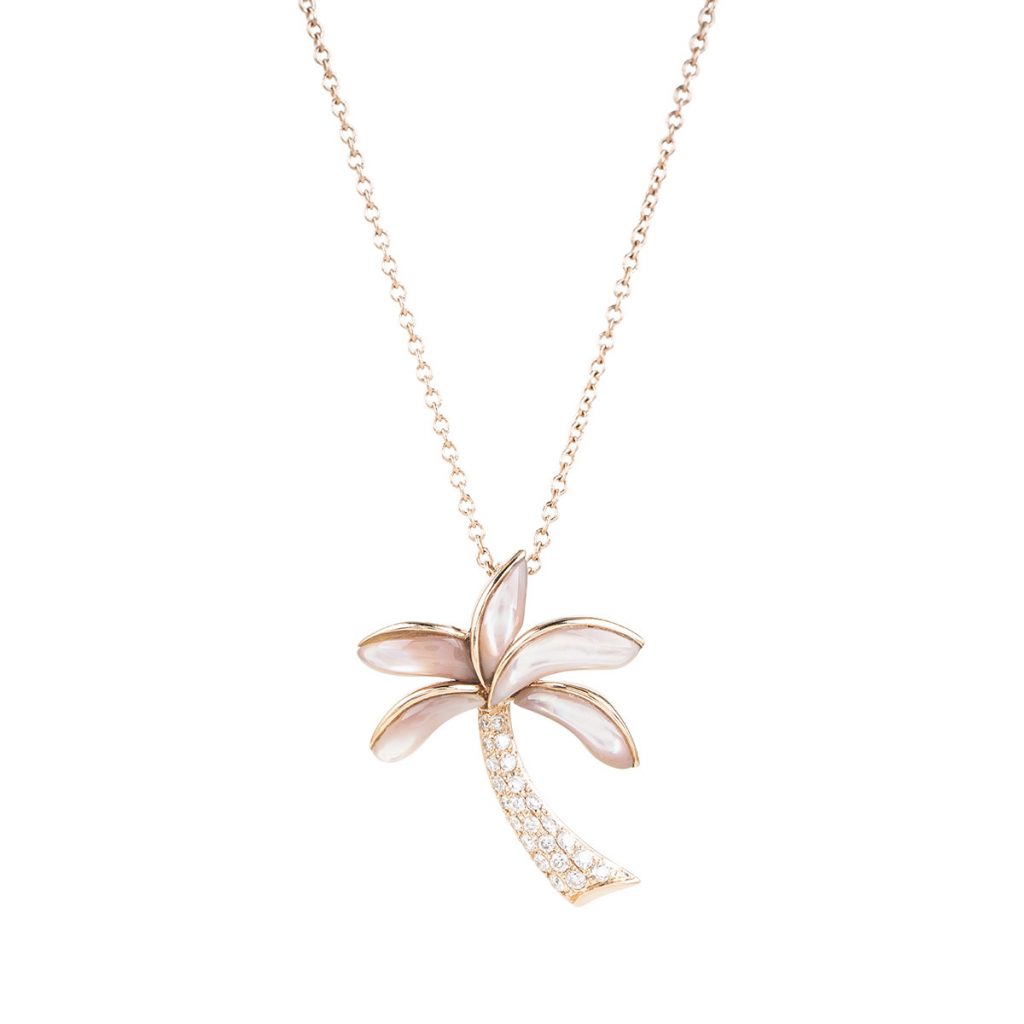 Vintage rose gold Na Hoku palm tree pendant set with diamonds and mother-of-pearl.