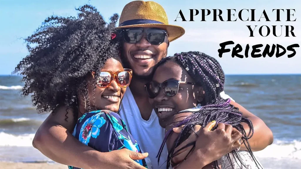 Group of three people on beach with text “Appreciate Your Friends”.