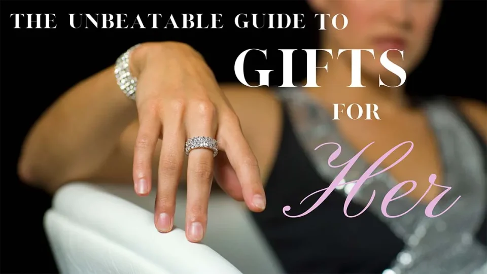 Woman’s hand with diamond bracelet and ring with text “The Unbeatable Guide to Gifts for Her”.