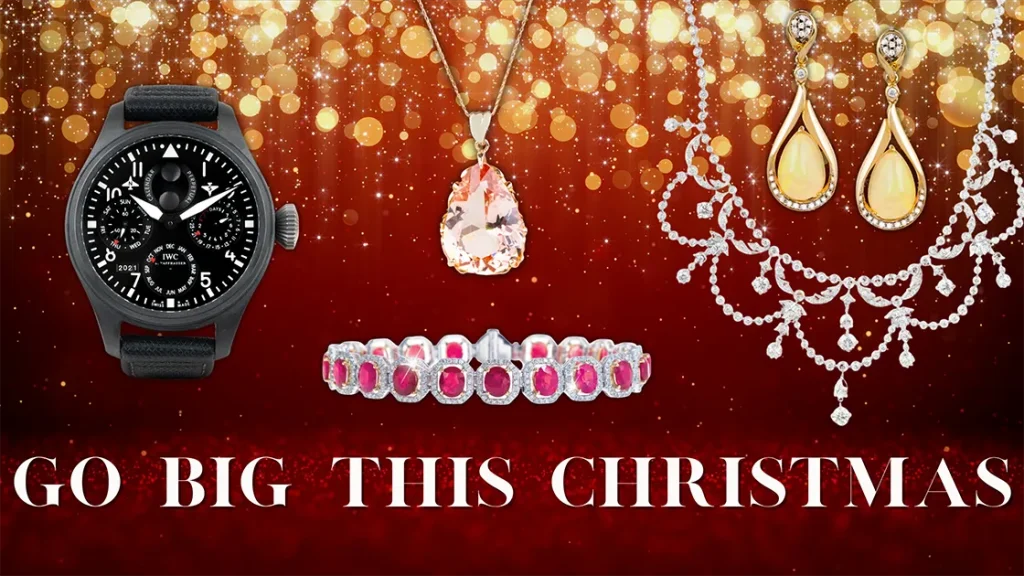 Various extravagant accessories on a red and gold glitter background with text “Go Big
This Christmas”.