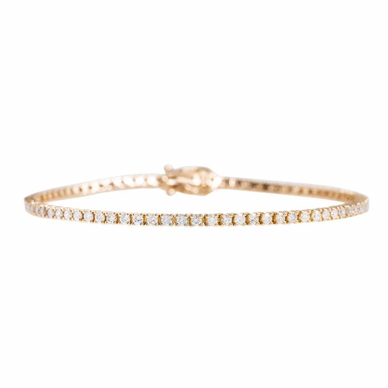 Men’s yellow gold diamond tennis bracelet.