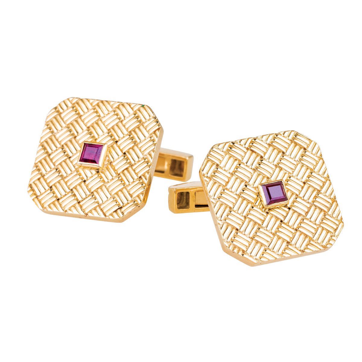 Vintage yellow gold etched Tiffany & Co. cufflinks centered with rubies.