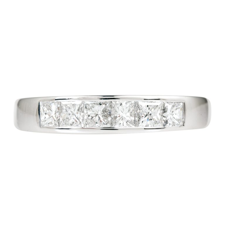 Men’s white gold wedding band with channel set diamonds.