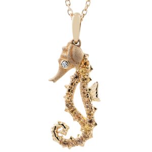 New Denny Wong Seahorse pendant set with diamonds and sapphires.