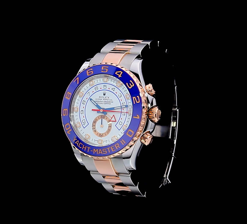 Pre-owned men's Rolex Yacht-Master II in stainless steel and yellow gold with a white dial and blue ceramic bezel.