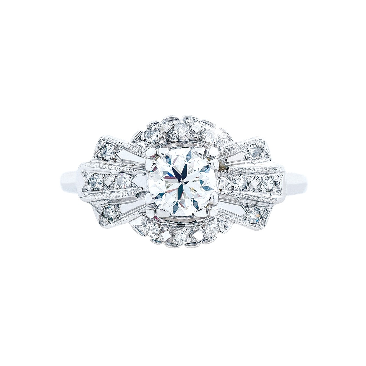 Antique engagement ring centered with a square diamond surrounded by smaller diamonds.