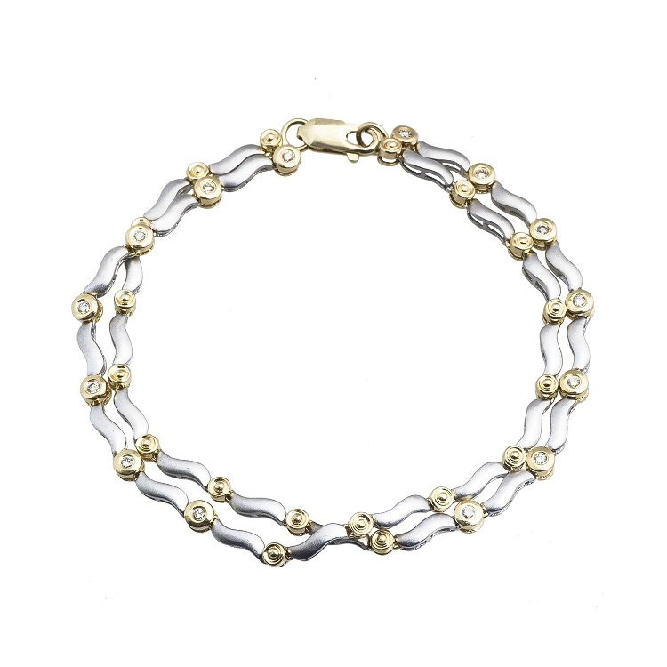 White and yellow gold link bracelet.